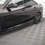 สเกิร์ตข้าง BMW F44 ทรง Maxton design สีดำเงา V.2