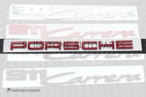 โลโก้ Porsche สีแดง