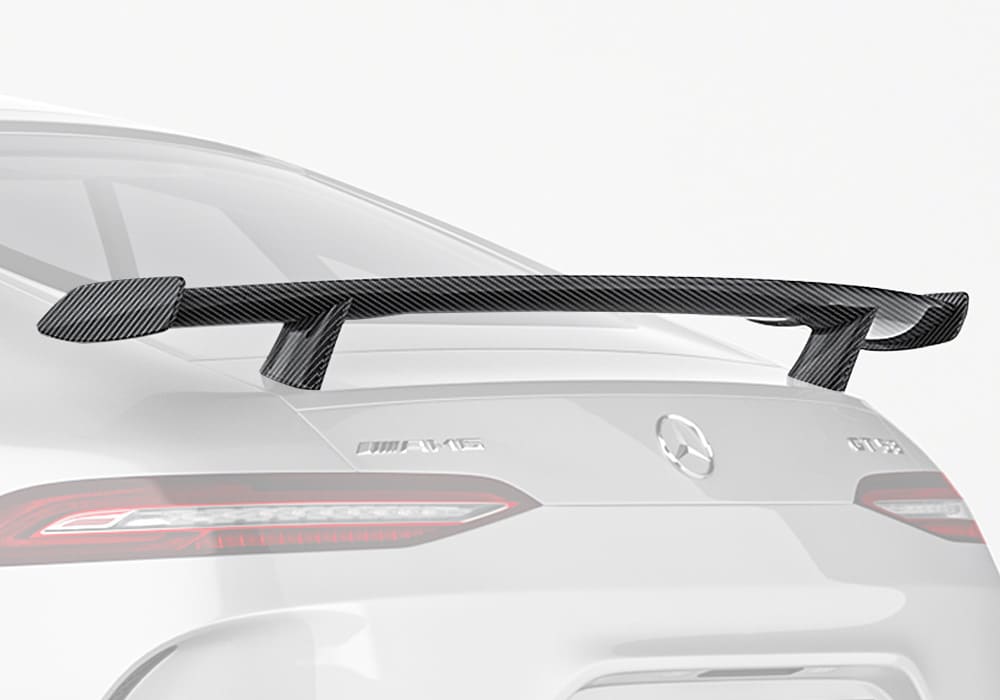 A clean rear angle photograph showcasing the Carbon Fiber Rear Spoiler integrated seamlessly with the AMG GT’s sleek rear design