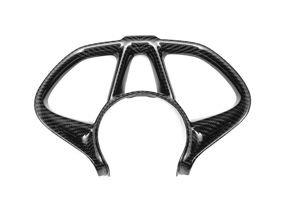 Full view of McLaren 720S steering wheel featuring Carbon Fiber Steering Wheel Trim with a high-gloss finish