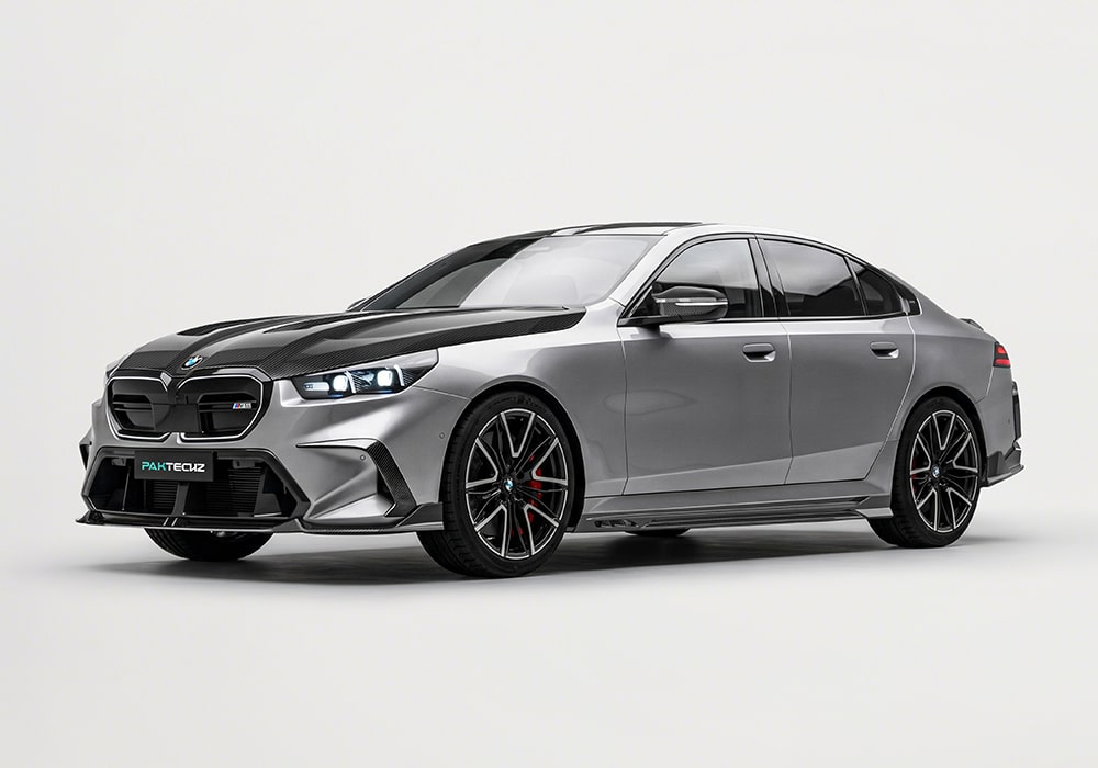 BMW M5 (G90) featuring a full carbon fiber aero kit, including front lip spoiler, side skirts, diffuser, and roof spoiler, enhancing its aggressive stance