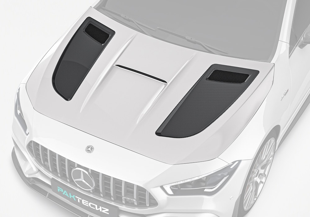 The sleek and aggressive lines of the carbon fiber hood integrate perfectly into the Mercedes-Benz CLA W118's sporty exterior, enhancing its visual impact