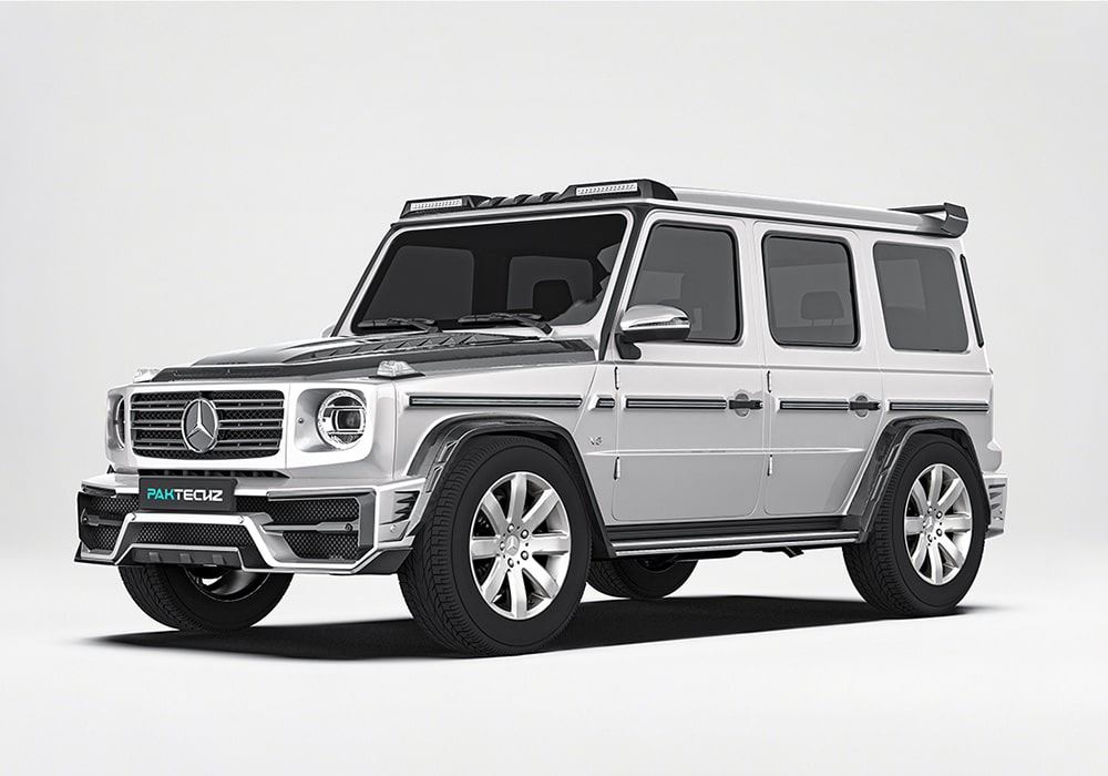 A detailed image showcasing the full suite of the Carbon Fiber Aerodynamics Kit, including the front splitter, side skirts, roof spoiler, and rear diffuser for the Mercedes G-Class W464