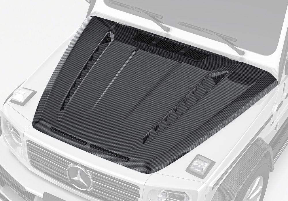 The sleek and aggressive design of the G-Class W464 Carbon Fiber Hood instantly elevates the SUV's powerful presence, exuding luxury and performance