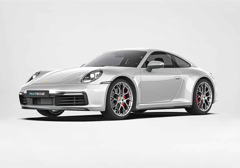 A stunning full-body image showcasing the Porsche 911 992.1 fitted with the complete Carbon Fiber Aero Kit, emphasizing the aggressive styling and race-ready appeal
