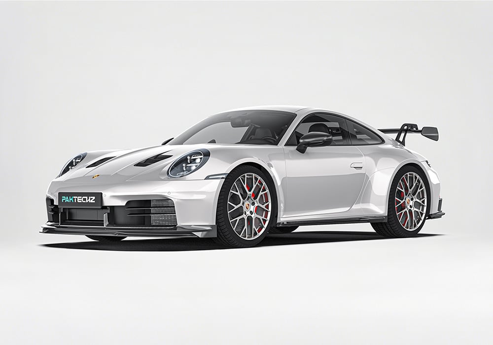 A complete front-end shot highlighting the dynamic profile of the Carbon Fiber Aero Kit, seamlessly complementing the sleek Porsche 911 design with aerodynamic precision
