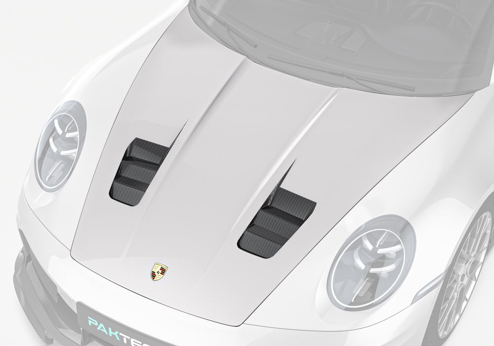 An aggressive front-end image of the Porsche 911 992.2 equipped with the Carbon Fiber Hood, highlighting its performance-focused design and seamless integration