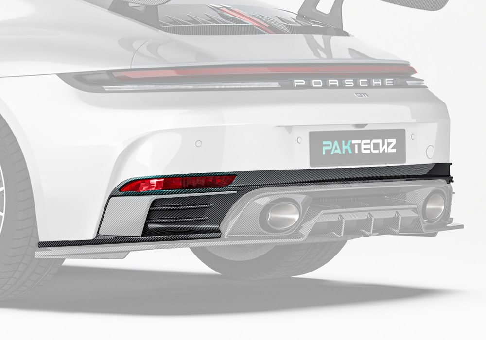 An elegant yet aggressive rear-end shot showcasing the Carbon Fiber Upper Rear Diffuser, highlighting its aerodynamic integration and sharp contours