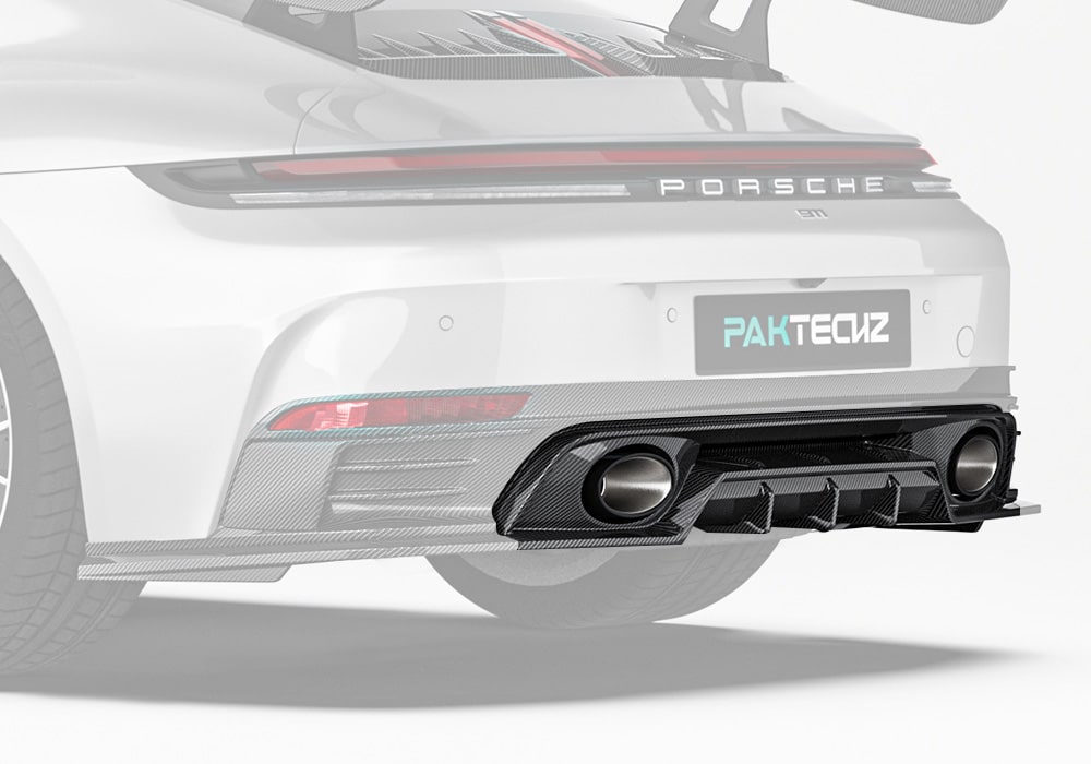 A full-width rear image of a Porsche 911 992.2 highlighting the sleek integration of the Carbon Fiber Lower Rear Diffuser