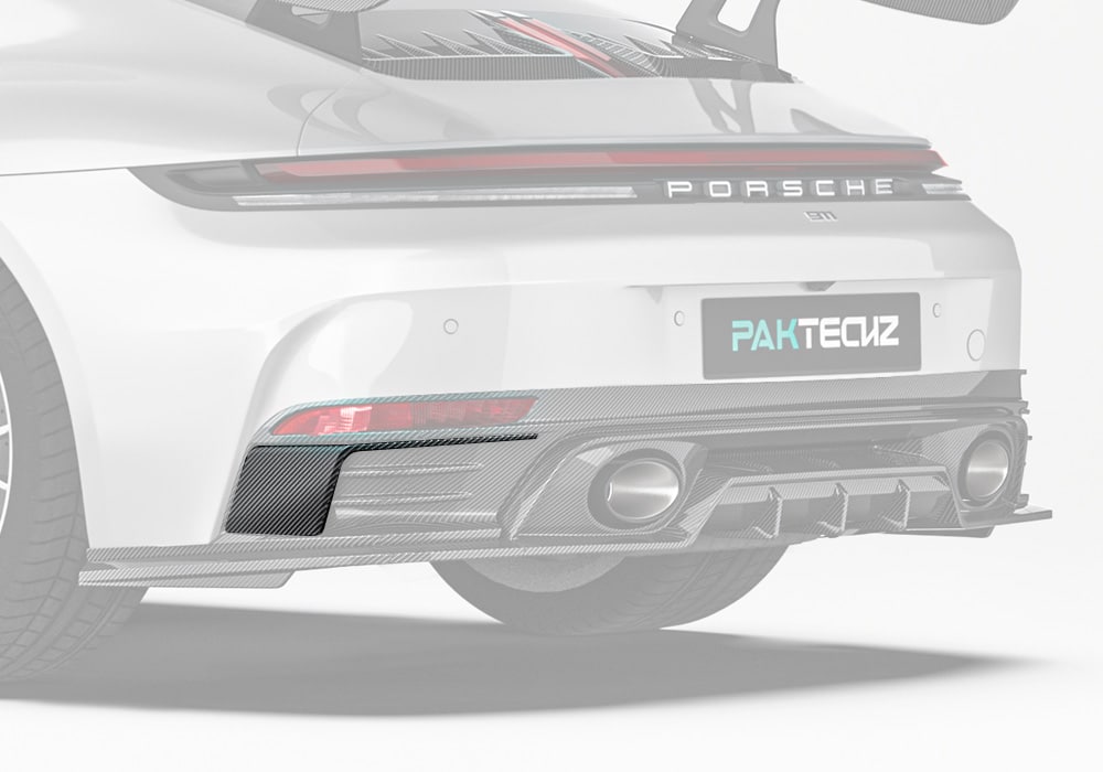 A full rear-angle view highlighting the Carbon Fiber Rear Canards, showing their sleek integration with the Porsche 911’s original bodywork.