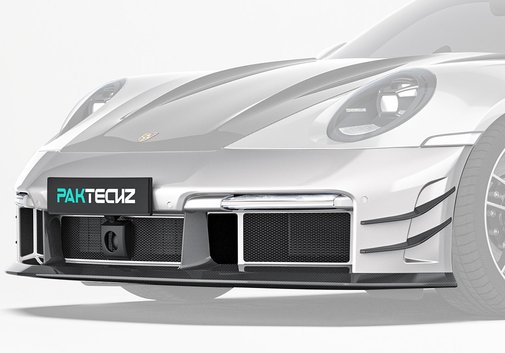 A clear frontal image showcasing the Carbon Fiber Front Bumper seamlessly integrated into the Porsche 992 Turbo S, emphasizing its refined, aggressive styling