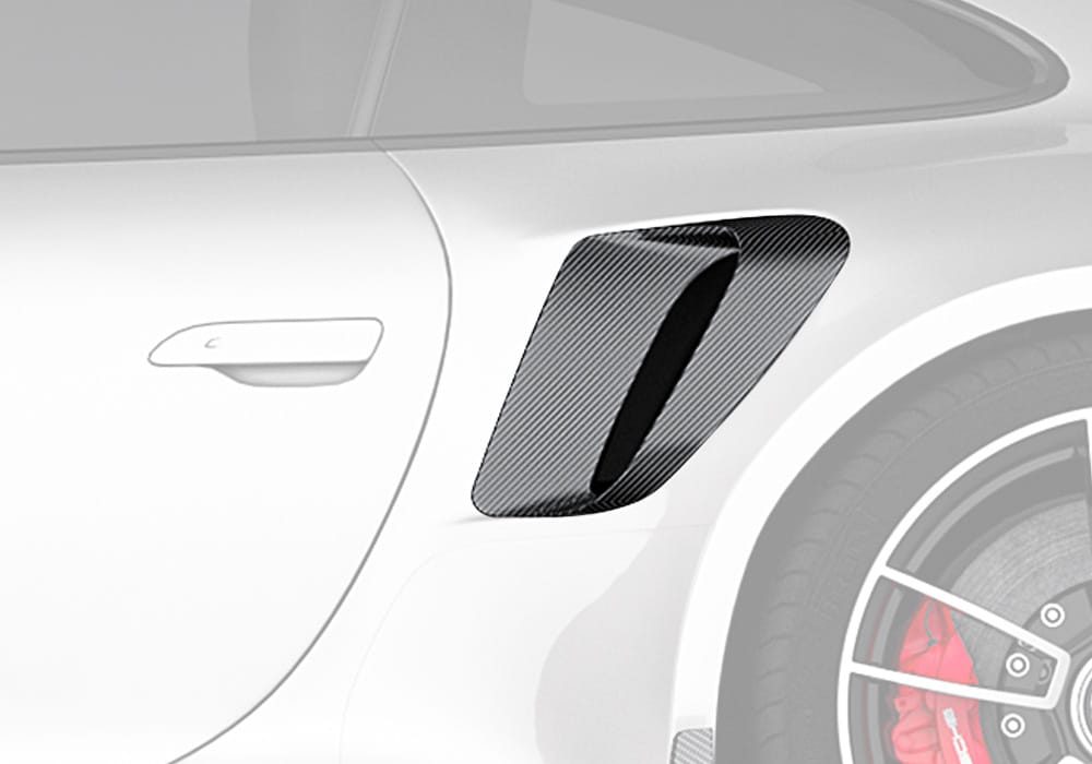 A clean side profile of the Porsche 992 Turbo S with the Carbon Fiber Side Air Intakes, highlighting their luxurious yet sporty appearance