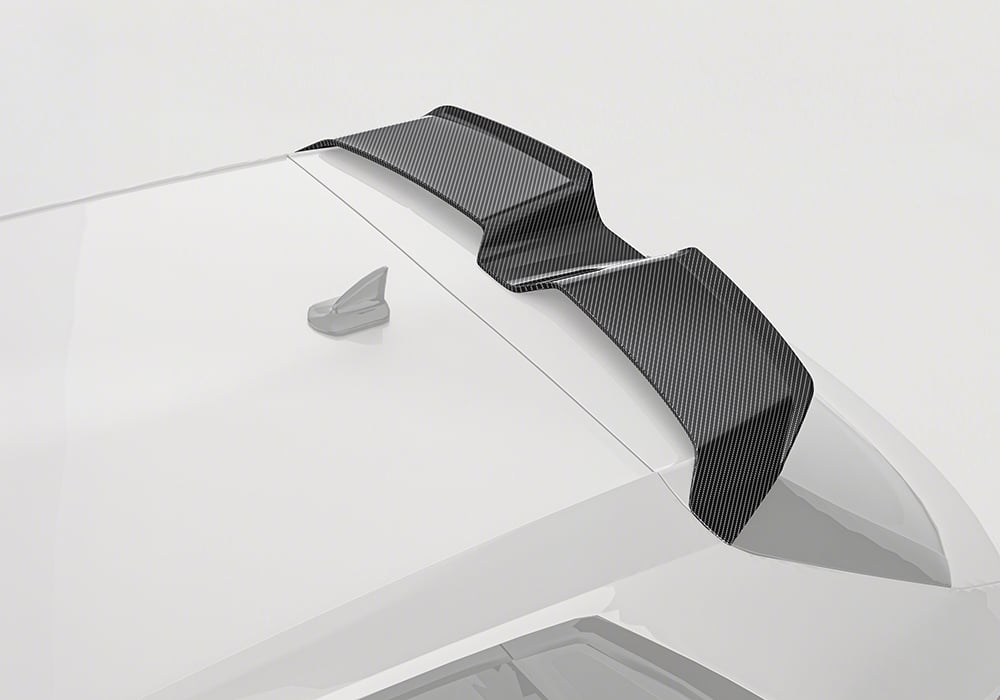 Audi RS3 (8Y) outfitted with a bold carbon fiber roof spoiler, enhancing rear-end aerodynamics and adding a sporty look