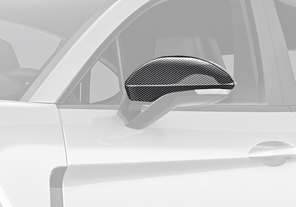 A detailed image highlighting the mirror cover’s carbon fiber weave texture and glossy finish, showcasing its luxurious and aerodynamic design
