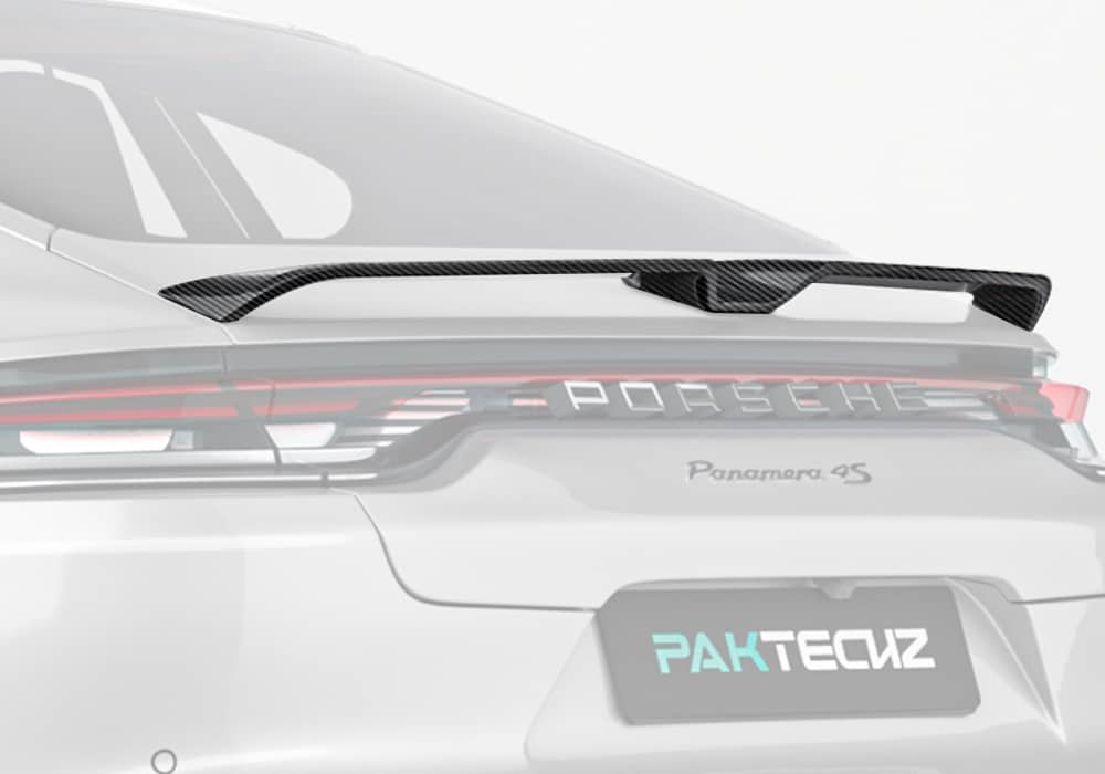 A stunning full rear view of the Panamera with the Carbon Fiber Rear Spoiler installed, highlighting its bold and sporty integration into the vehicle’s silhouette