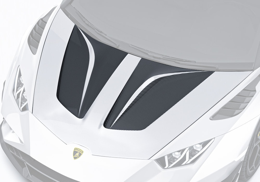 Full frontal view of Lamborghini Huracan EVO with the bold carbon fiber hood, accentuating the aggressive styling