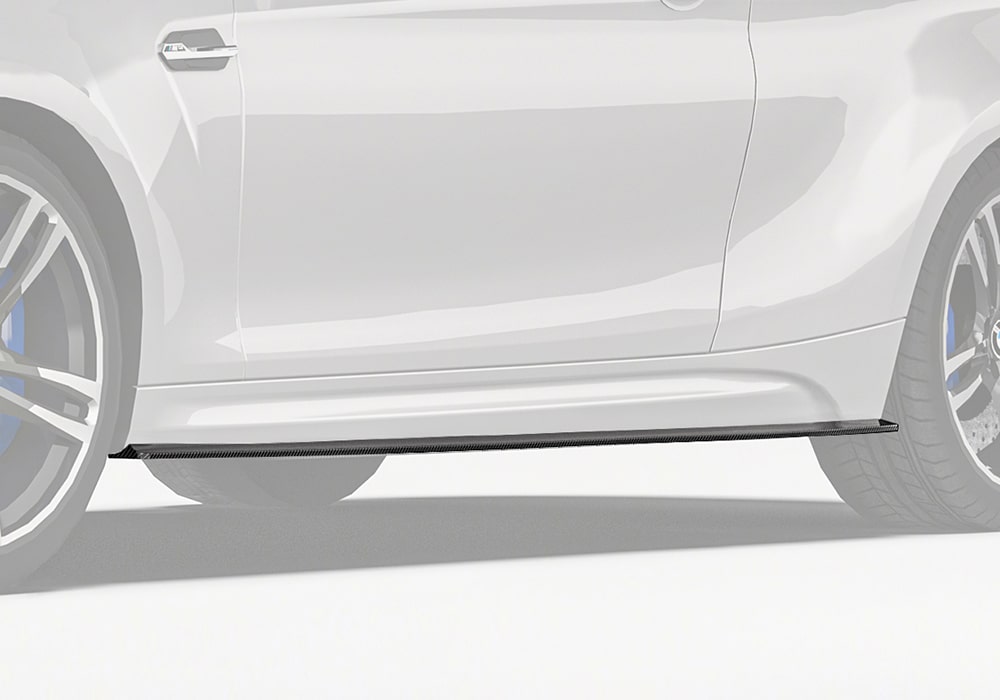 BMW M2 F87 equipped with the Carbon Fiber Side Skirts, emphasizing the aggressive and sleek exterior of the car