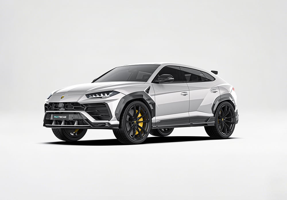 Front-angle shot of the Lamborghini Urus, displaying the sharp and aerodynamic design of the carbon fiber front splitters.
