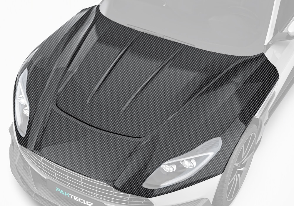 Aston Martin DB11 featuring the carbon fiber hood upgrade, highlighting its luxurious yet sporty appearance