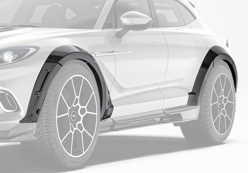 Aston Martin DBX equipped with Carbon Fiber Fender Flares, side profile view emphasizing wide arches