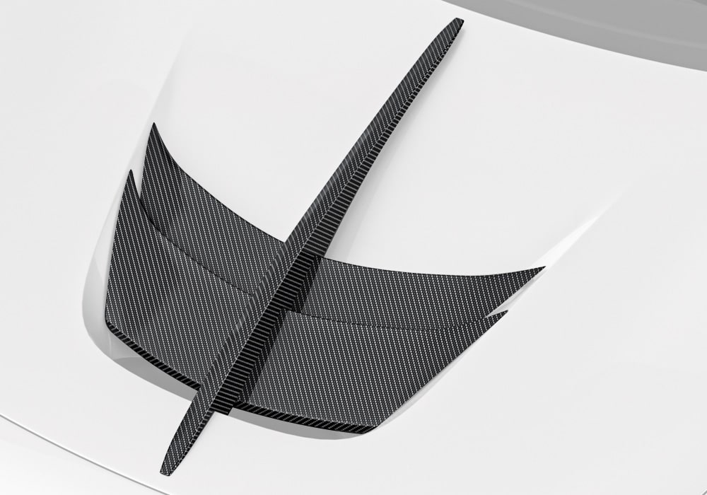 A Ferrari F8 front profile view emphasizing the seamless installation of the Carbon Fiber Hood Vent Trim