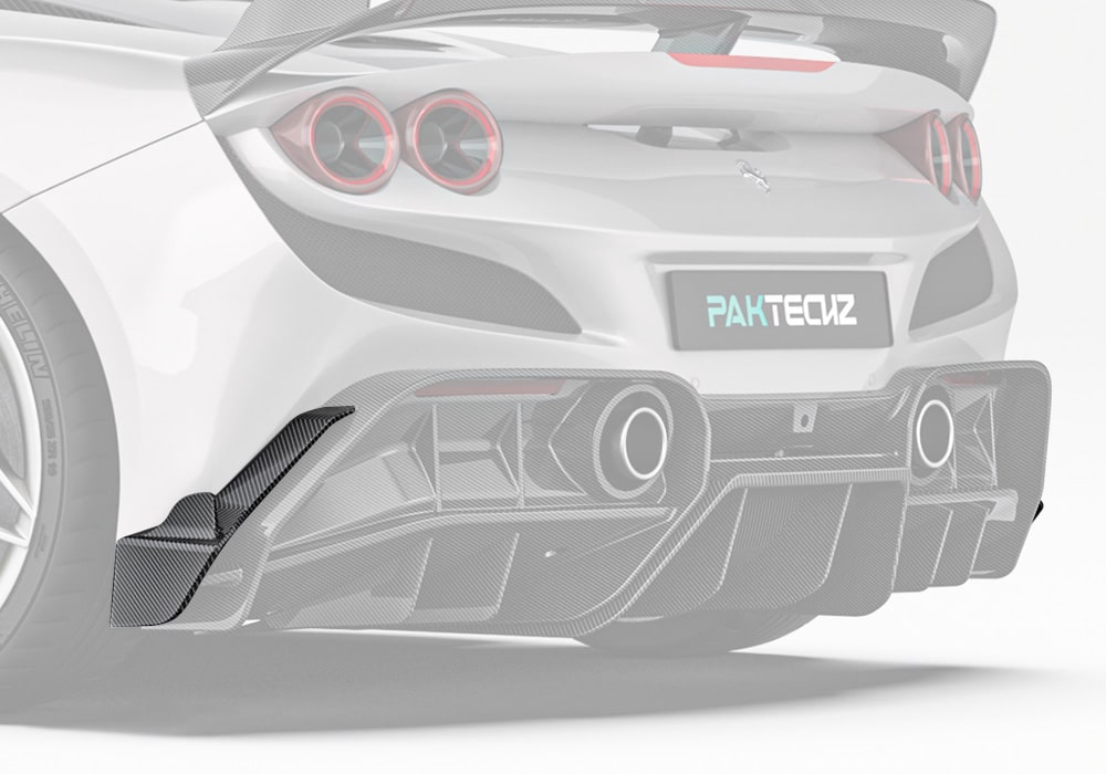 A rear side profile shot of the Ferrari F8, showcasing the stylish integration of the Carbon Fiber Rear Side Splitters with the rear quarter panel