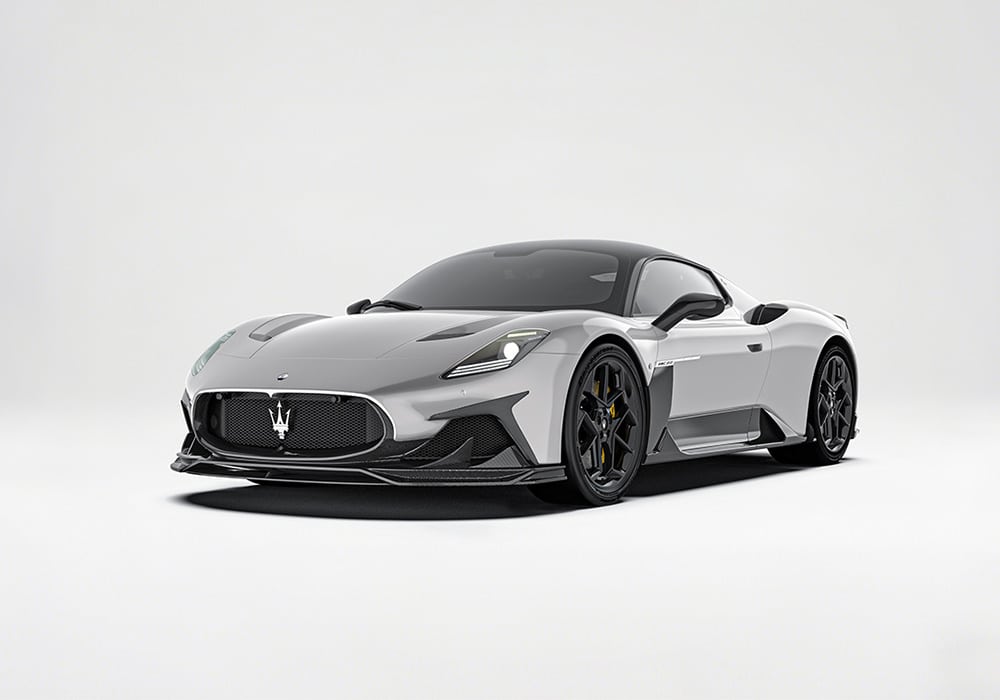 A stunning image of the Maserati MC20 speeding along an open highway, showcasing the kit’s seamless integration with the vehicle’s body.