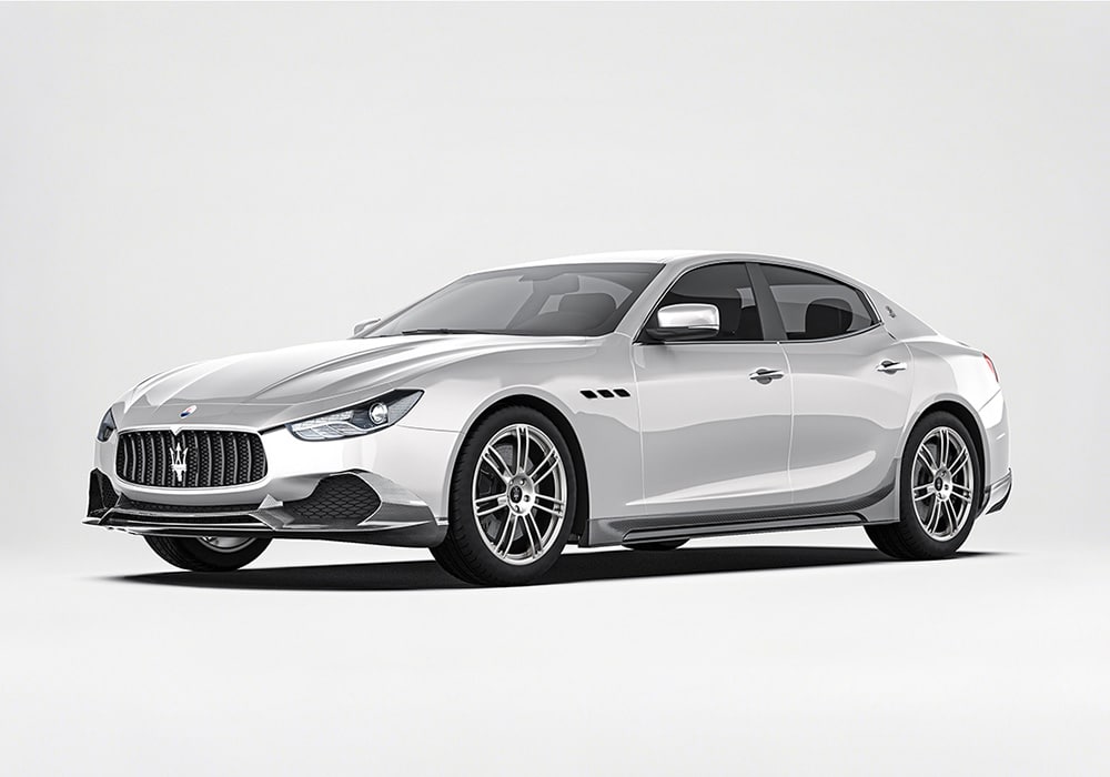 Maserati Ghibli featuring the Carbon Fiber Aerodynamics Kit, including carbon fiber front splitter, rear diffuser, and sleek side skirts