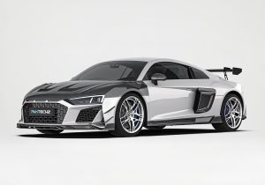 Audi R8 showcasing the full carbon fiber aerodynamic package including side skirts, wing spoiler, and splitters for a cohesive and aggressive design