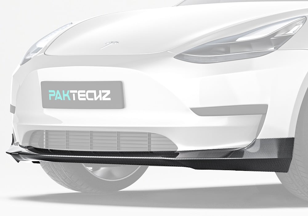 A Tesla Model 3 showing off its new carbon fiber front lip integrated into the front bumper for a more dynamic and performance-driven look