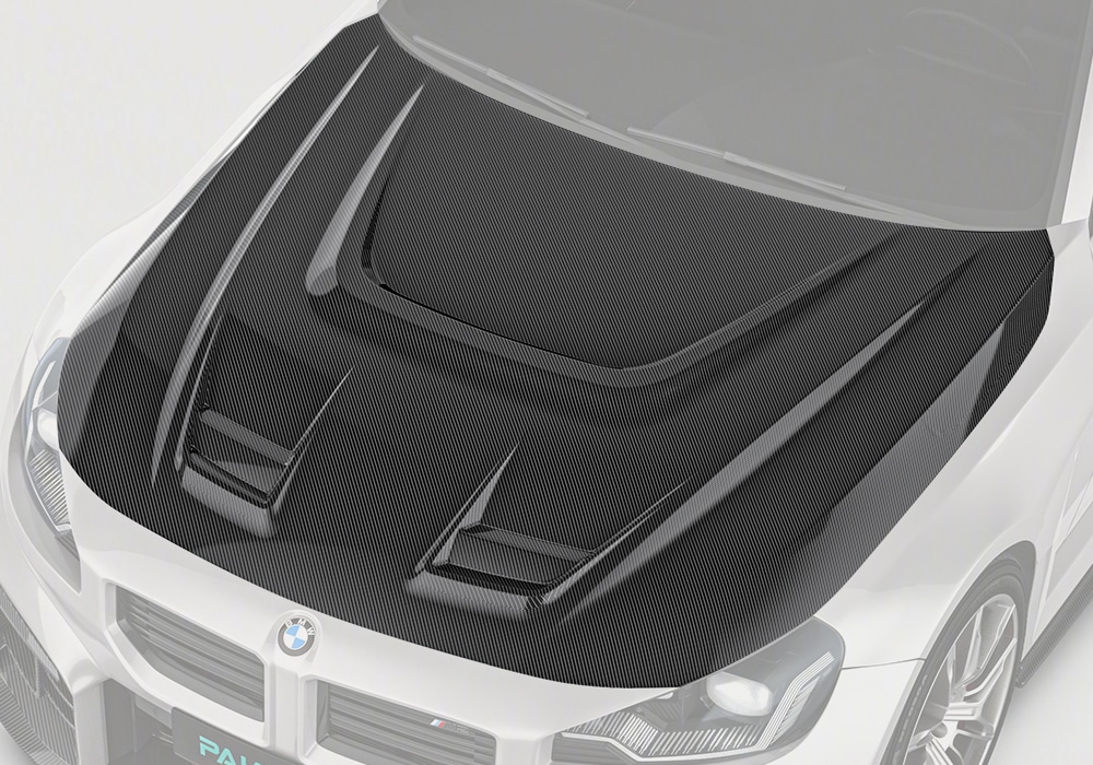 BMW M2 G87 equipped with the Carbon Fiber Hood, emphasizing its sleek, aggressive design seamlessly integrated with the vehicle’s body