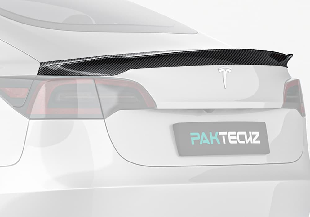 Bold rear profile highlighting the sleek aerodynamic addition of the carbon fiber rear spoiler