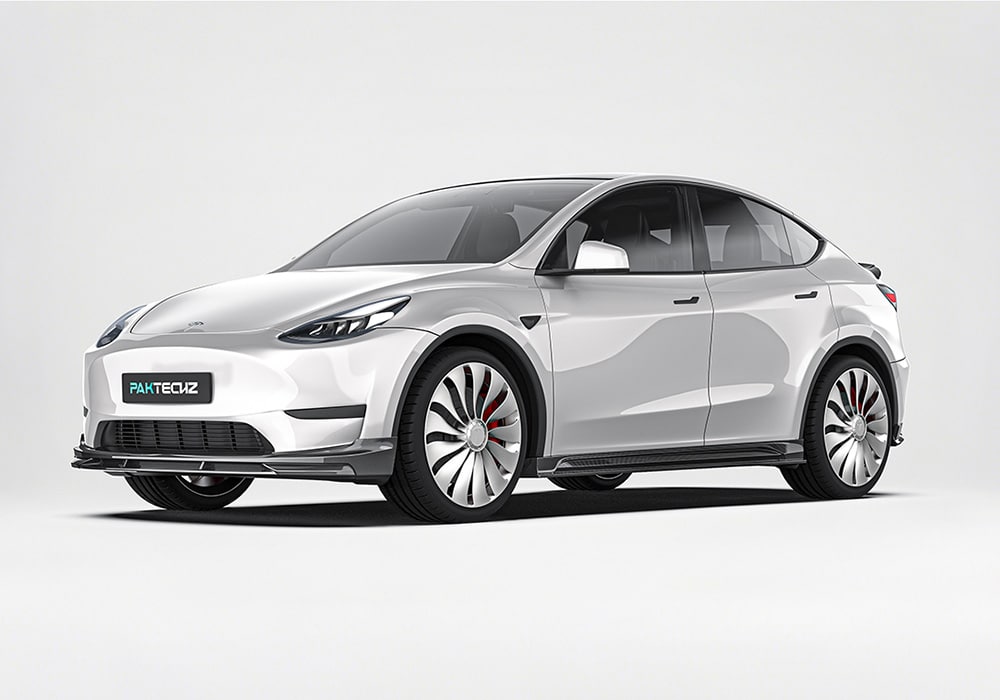A Tesla Model Y with the Carbon Fiber Aero Kit installed, highlighting the cohesive integration between the front lip, side skirts, spoiler, and rear diffuser