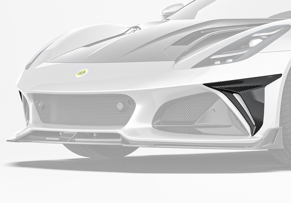 Lotus Emira with carbon fiber front canards attached, showcasing an aggressive and aerodynamic front-end upgrade