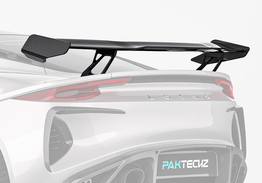 Lotus Emira showcasing the carbon fiber rear wing, emphasizing its sleek design and functional placement
