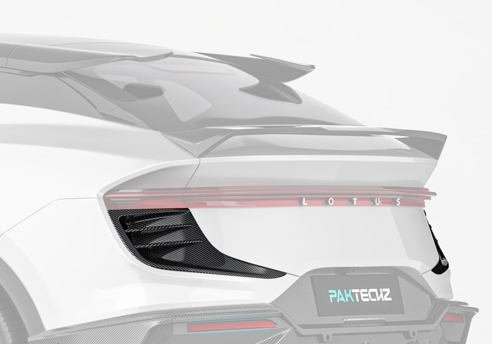 A stylish rear shot of the Lotus Eletre equipped with sleek carbon fiber vent trims, blending perfectly with the bodywork for a performance-inspired look