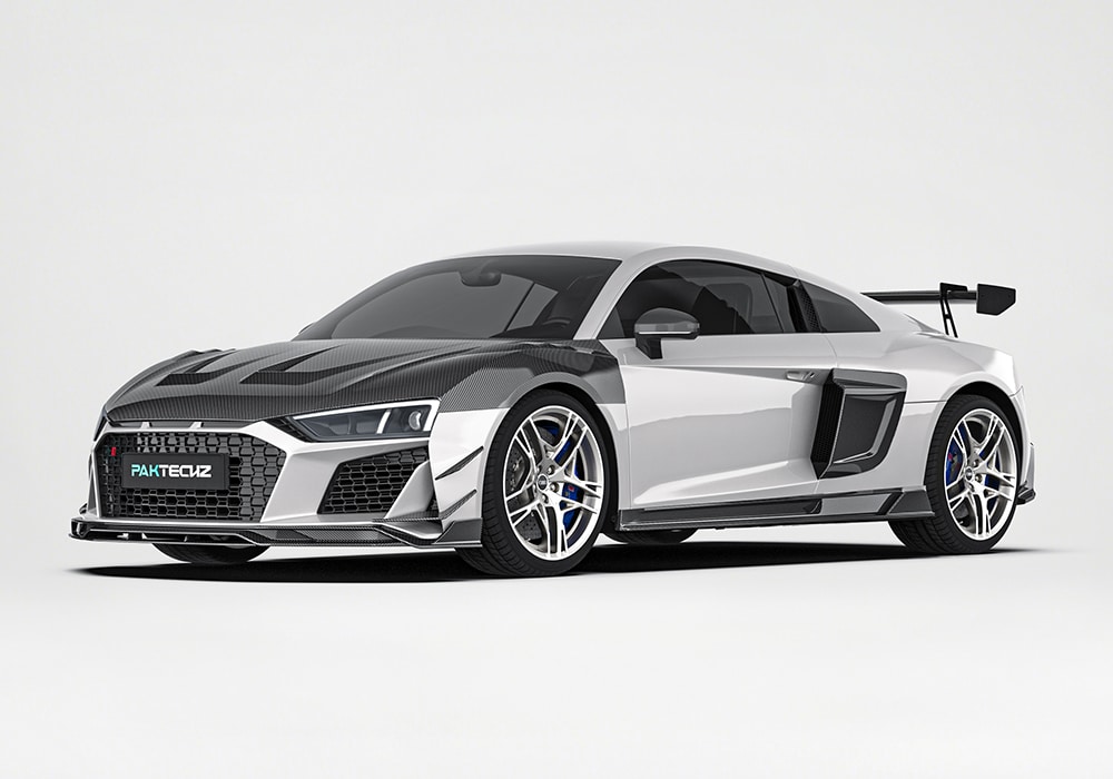 Audi R8 showcasing the full carbon fiber aerodynamic package including side skirts, wing spoiler, and splitters for a cohesive and aggressive design