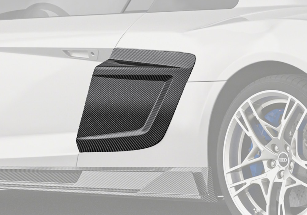 Audi R8 equipped with carbon fiber side blades that enhance the car’s sharp silhouette for luxury styling and improved aerodynamics