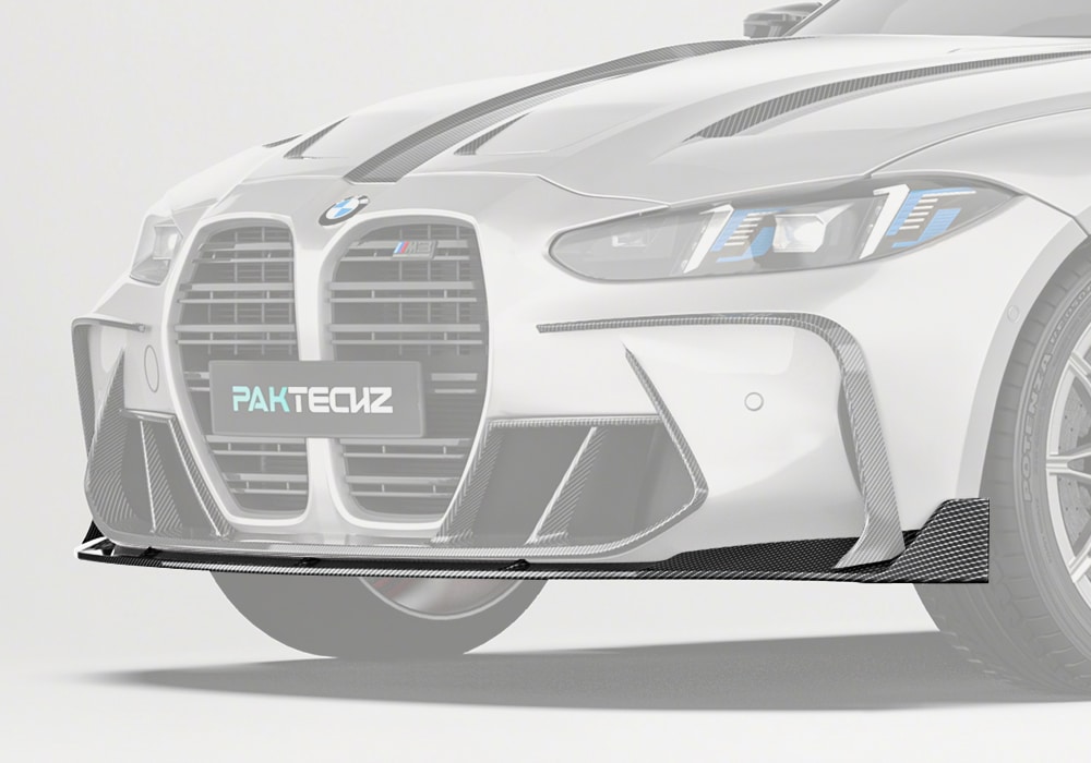 A full front view showcasing the Carbon Fiber Front Lip, highlighting its bold and aggressive integration with the BMW M3 G80 bumper design