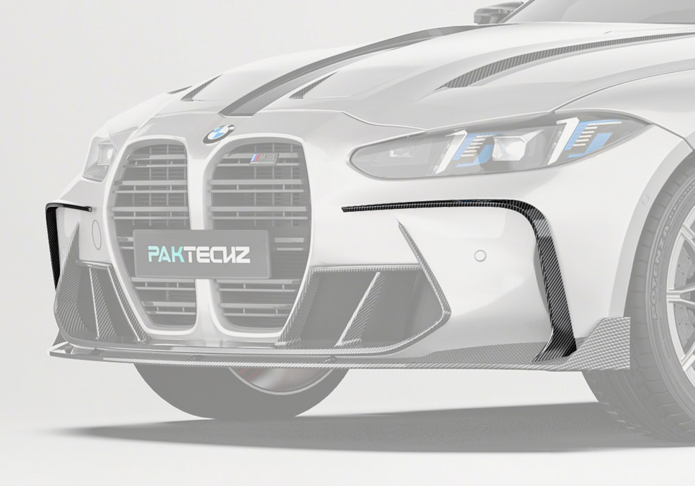 A complete front profile showcasing the Carbon Fiber Front Canards seamlessly integrated into the BMW M3 G80 bumper design, adding aggressive styling