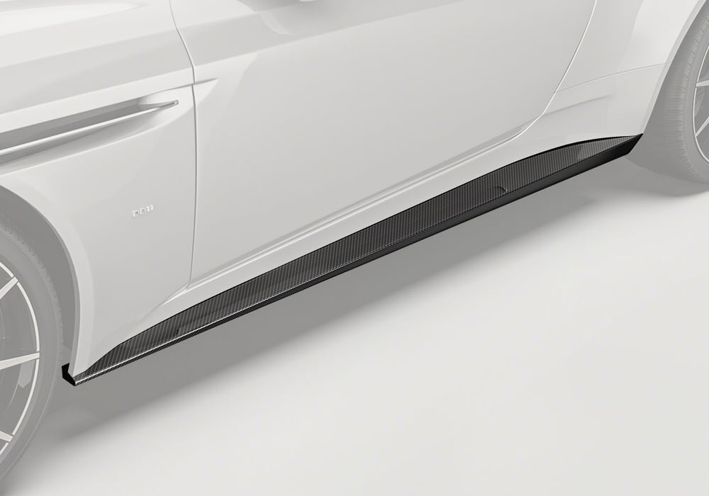 Aston Martin DB11 equipped with Carbon Fiber Side Skirts showcasing a sleek and dynamic full-profile look