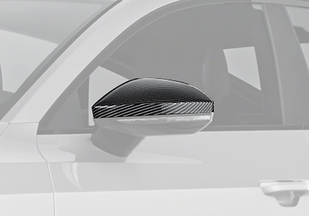 High-gloss carbon fiber mirror cover showcasing intricate craftsmanship and reflective finish for modern styling