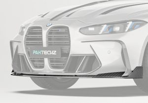 A complete front view of the BMW M4 G82, showcasing the aggressive styling and bold appearance of the Carbon Fiber Front Lip