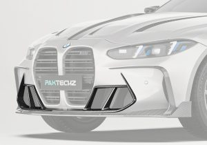 A full front shot showcasing the BMW M4 G82, with the Carbon Fiber Front Vent Trim adding refined and stylish accents to the air vents
