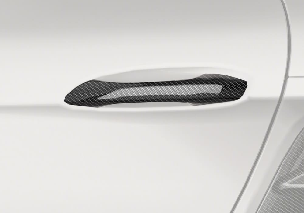 Porsche 718 fitted with Carbon Fiber Door Handles, showcasing an enhanced side profile and premium styling