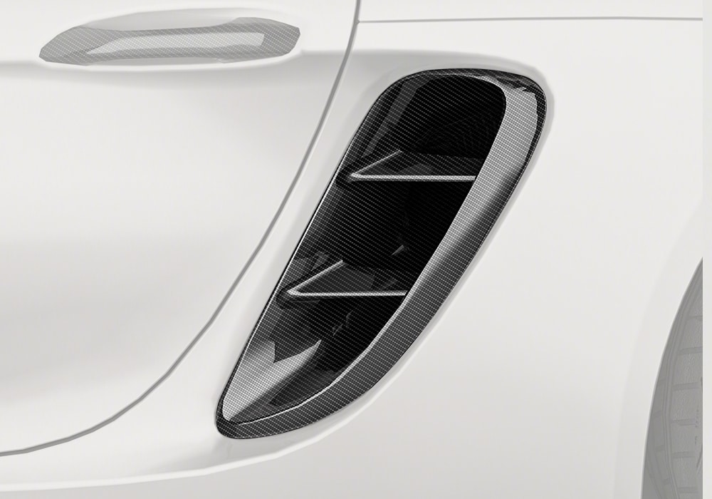 Porsche 718 interior fitted with premium Carbon Fiber Inner Vents showcasing a sophisticated dashboard design