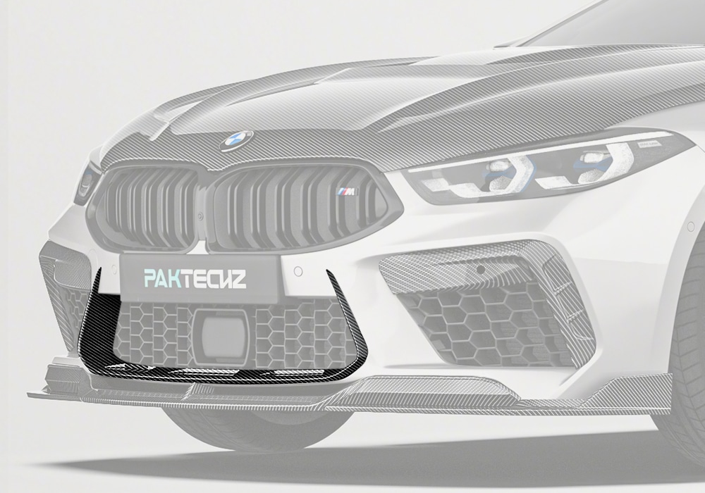 A full front view of the BMW M8 F92, showcasing the sleek integration of the Carbon Fiber Front Vent Trim with the grille and vent design