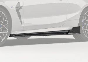 A full side view of the BMW M8 F93, showcasing the elegant appearance of the installed Carbon Fiber Side Skirts enhancing the car’s stance