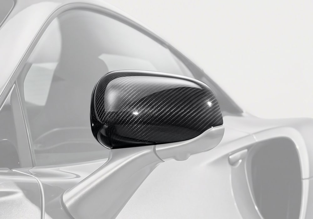 McLaren Artura fitted with Carbon Fiber Mirror Covers, showcasing enhanced side profile and luxury styling