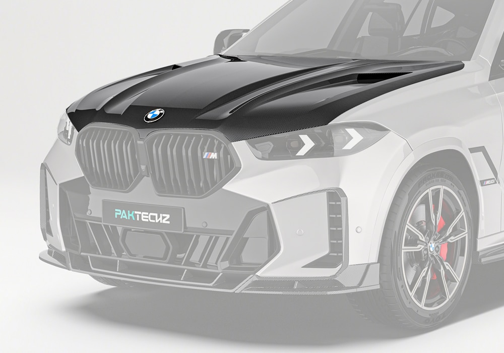 A striking full-frontal image of BMW X6 G06, featuring the Carbon Fiber Hood seamlessly integrated to elevate the SUV’s athletic appearance